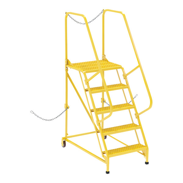 A yellow Vestil semi-trailer access ladder with grip strut steps.