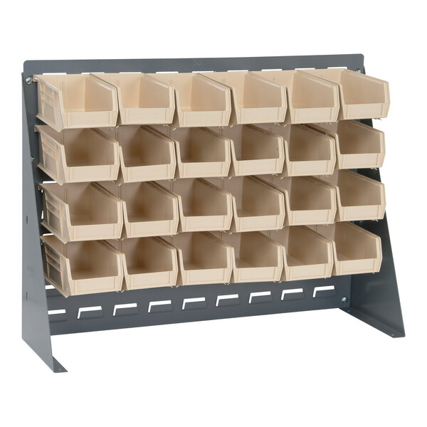 A Quantum steel bench rack with many ivory bins on it.