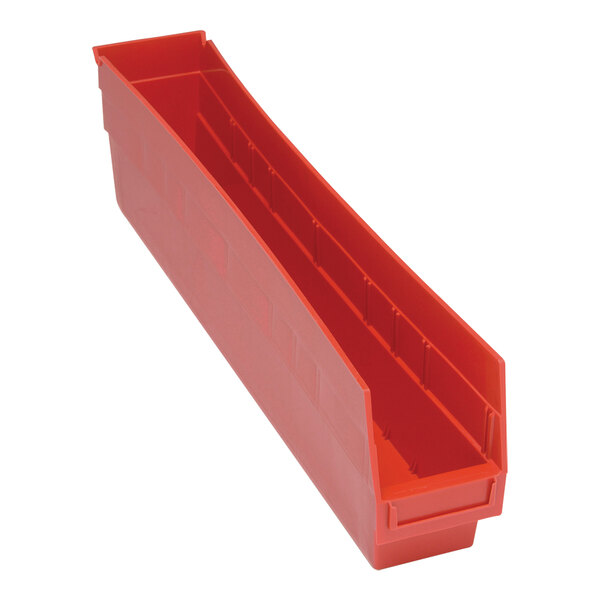 A red plastic Quantum shelf bin with two compartments.