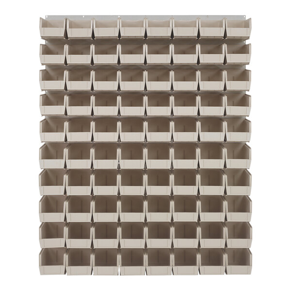 A large stack of ivory plastic bins on a white Quantum louvered panel.