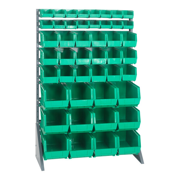 A gray steel Quantum rack with green bins on it.