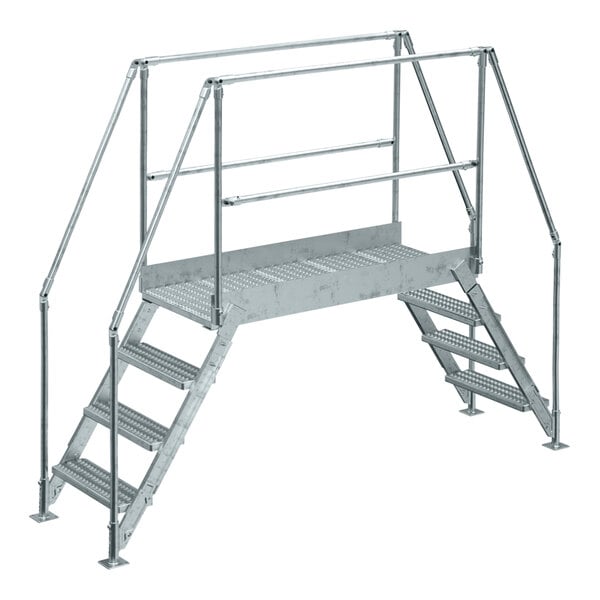 A Vestil galvanized steel crossover ladder with metal steps and railings.