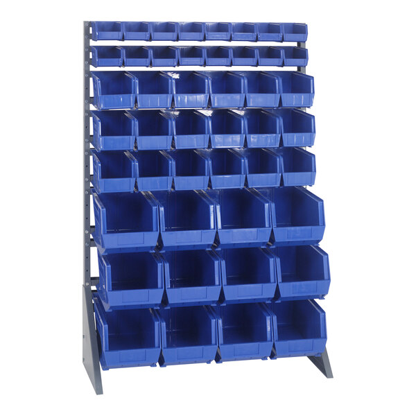 A gray steel rack with blue bins on it.