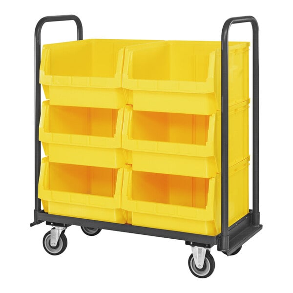 A black Quantum cart with yellow bins on it.