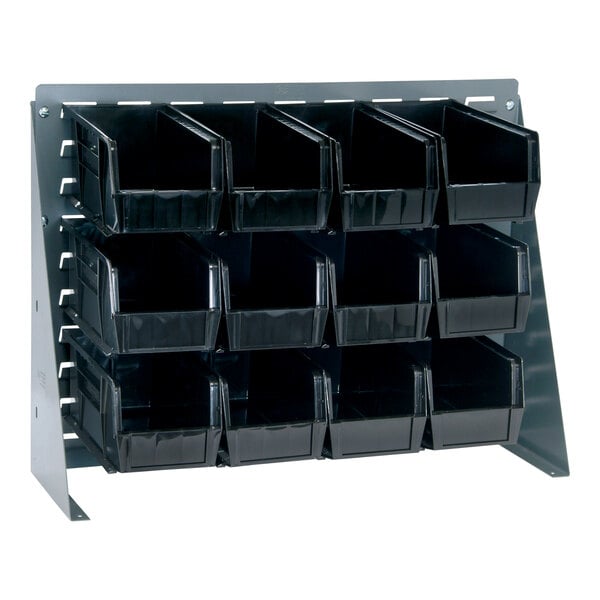 A Quantum gray steel bench rack with black bins on it.