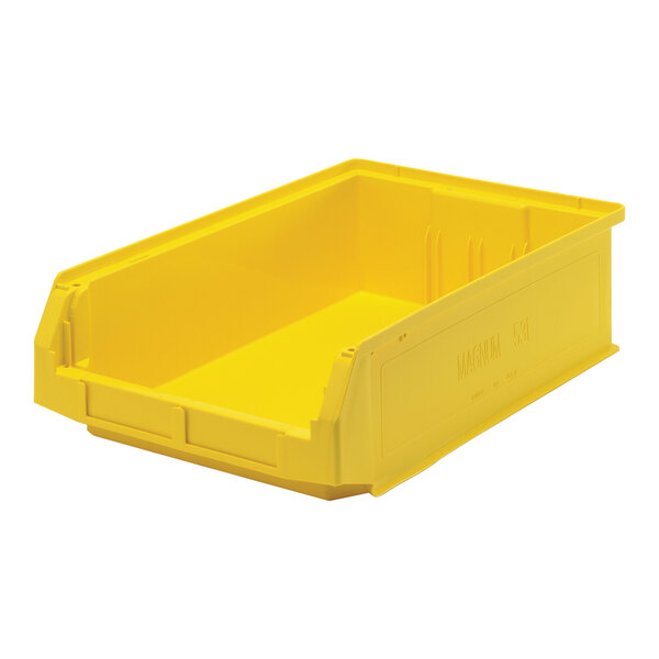 A yellow plastic Quantum storage tote bin.