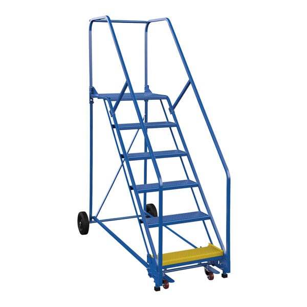 A blue steel Vestil rolling warehouse ladder with black wheels.