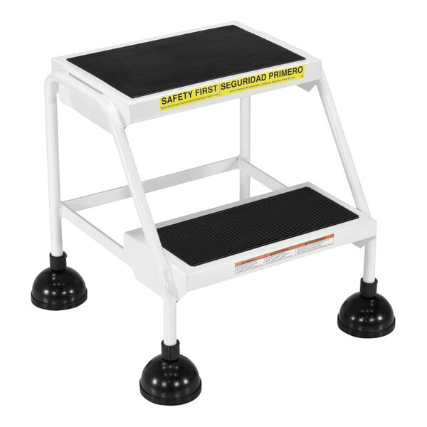 A white Vestil step ladder with black wheels.