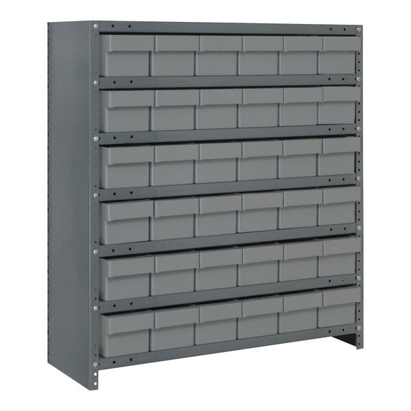 A Quantum grey steel closed shelving system with grey drawers.