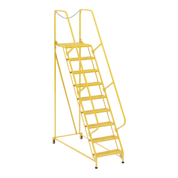 A yellow metal Vestil maintenance ladder with grip strut steps.