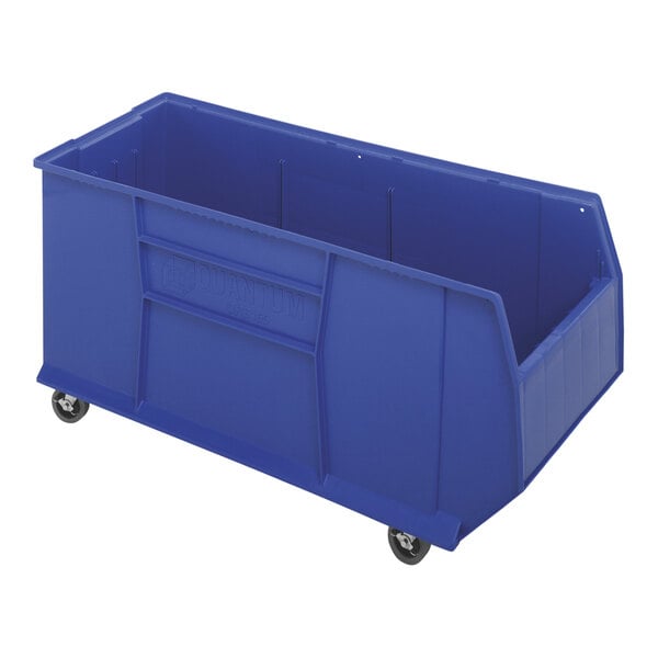 A blue plastic Quantum mobile pallet rack container on wheels.