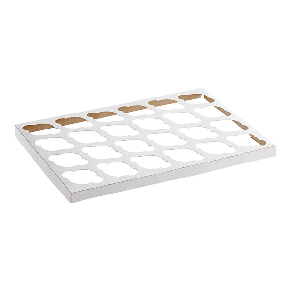 A white Baker's Lane cardboard tray with holes for 24 mini cupcakes.