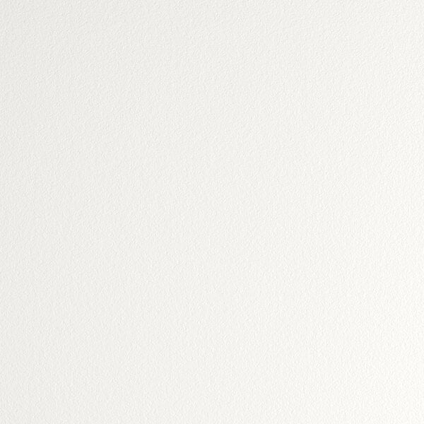 A white surface with small dots.