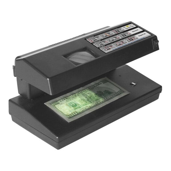 A black 4-Way Magnetic and UV Counterfeit Detector scanning a dollar bill.