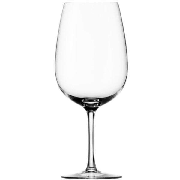 A close-up of a clear Stolzle Bordeaux wine glass with a stem.