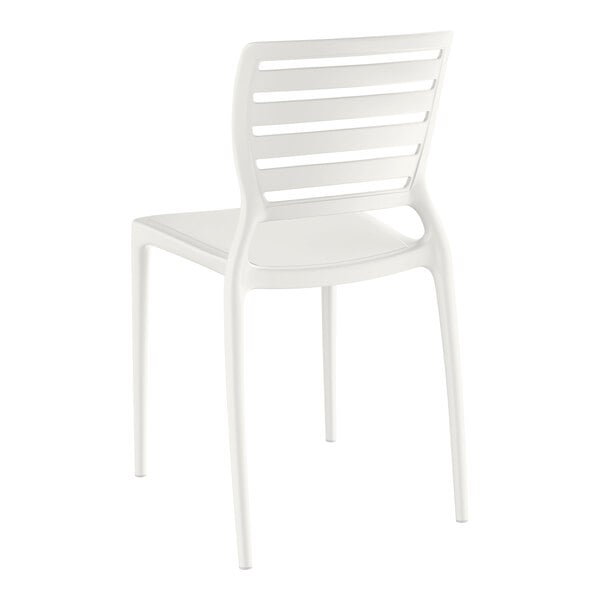 A white resin side chair with slats on the back.