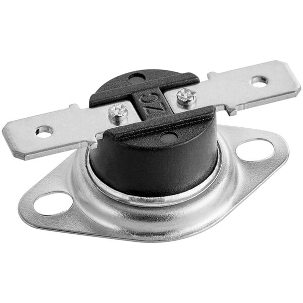 A black and silver metal plate with two screws on it.