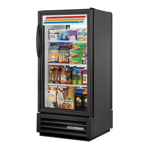 A black True refrigerated glass door pass-through merchandiser full of drinks with LED lighting.