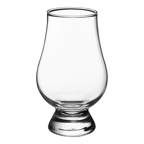 A clear Stolzle Glencairn whiskey glass with a base.