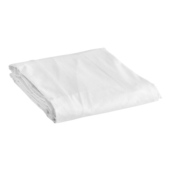 A white pleated bed skirt folded on a white background.