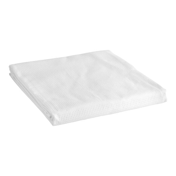 A folded white Adorn top sheet on a white surface.