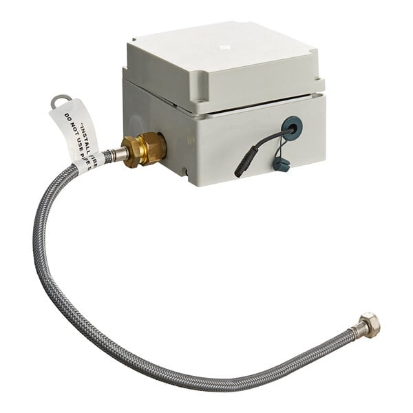 A close-up of the American Standard Selectronic touchless faucet in a white box with a hose attached.