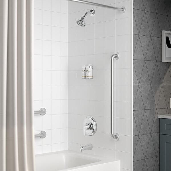 An American Standard Colony Pro bath and shower trim kit in a bathroom with a shower and bathtub.