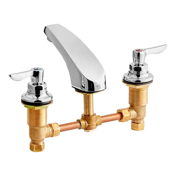 An American Standard deck-mount faucet with cast brass spout and chrome lever handles.