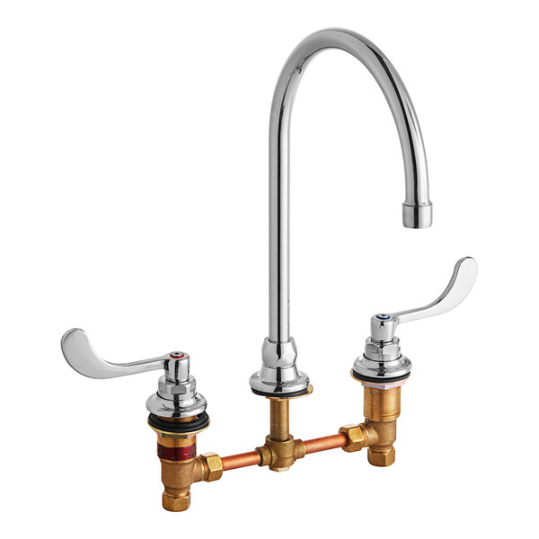 An American Standard deck-mount faucet with two wrist blade handles and a swivel gooseneck spout.