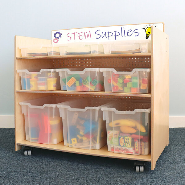 A Whitney Brothers wooden STEM cart with plastic bins on a wooden shelf.