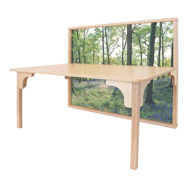 A Whitney Brothers wood table with a picture of a forest.