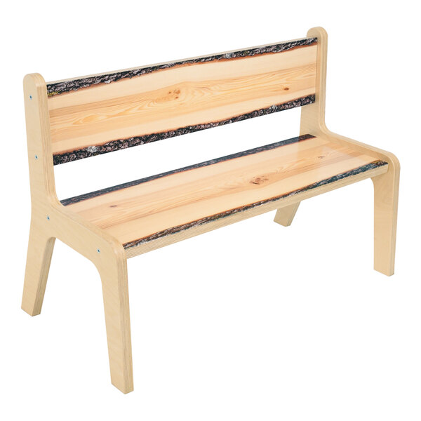 A Whitney Brothers wooden live edge bench.