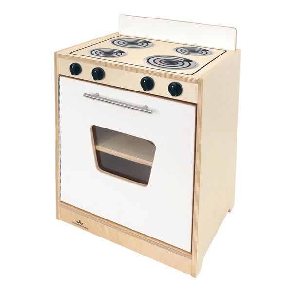 A Whitney Brothers white wooden stove with an oven window.