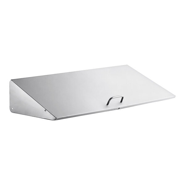 A white rectangular lid with a metal handle.