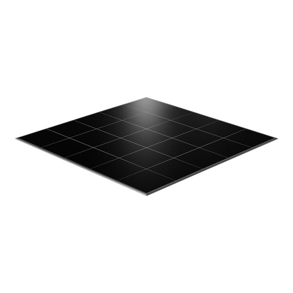 A black California Portable Dance Floor tile with ADA-compliant edging.