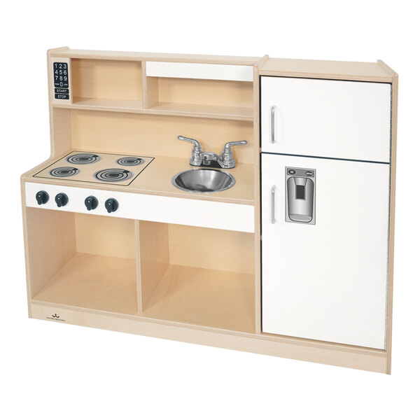 A white wooden toy kitchen with a sink and cupboard.