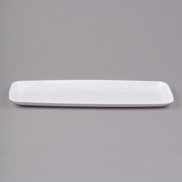 A white rectangular Sabert polypropylene platter.
