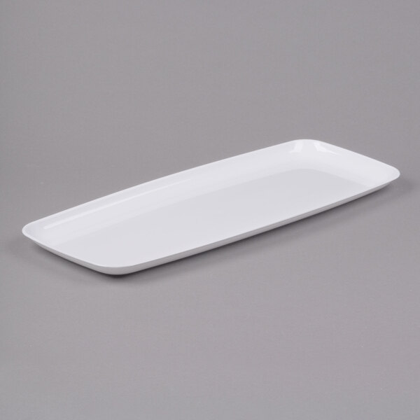 A white rectangular Sabert polypropylene platter with a handle.