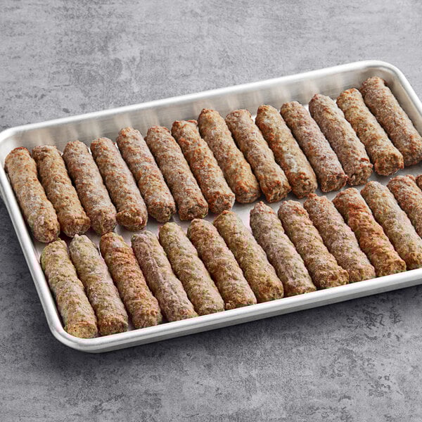 A tray of Hatfield sage sausage links on a gray surface.