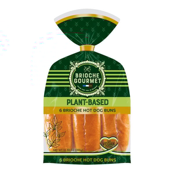A package of Brioche Gourmet plant-based hot dog buns on a counter.