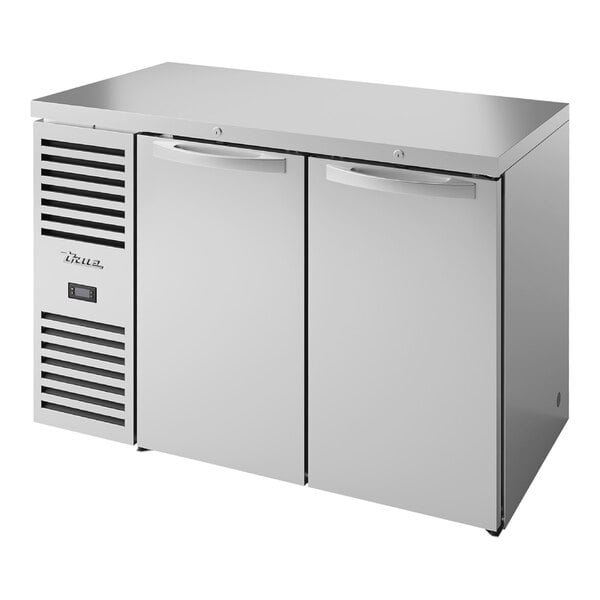 A stainless steel True back bar refrigerator with two doors.