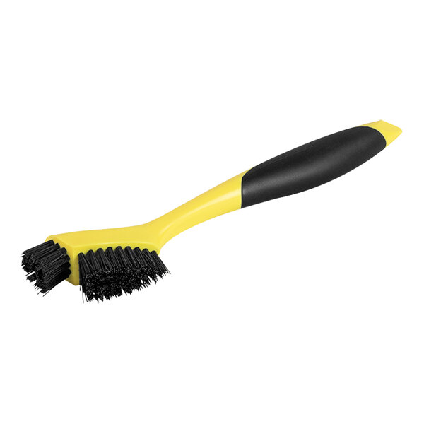 A yellow Lodge Corner / Groove Scrub Brush with a black handle and black bristles.