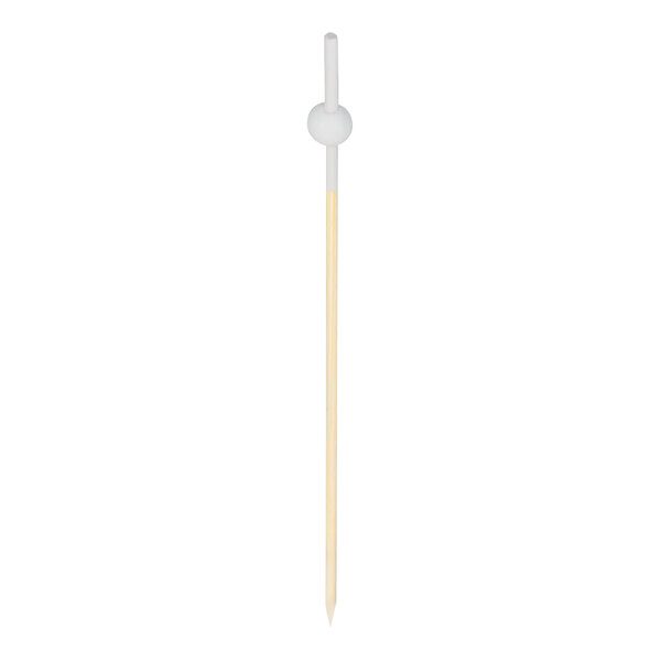 A white wooden food pick with a beaded end.