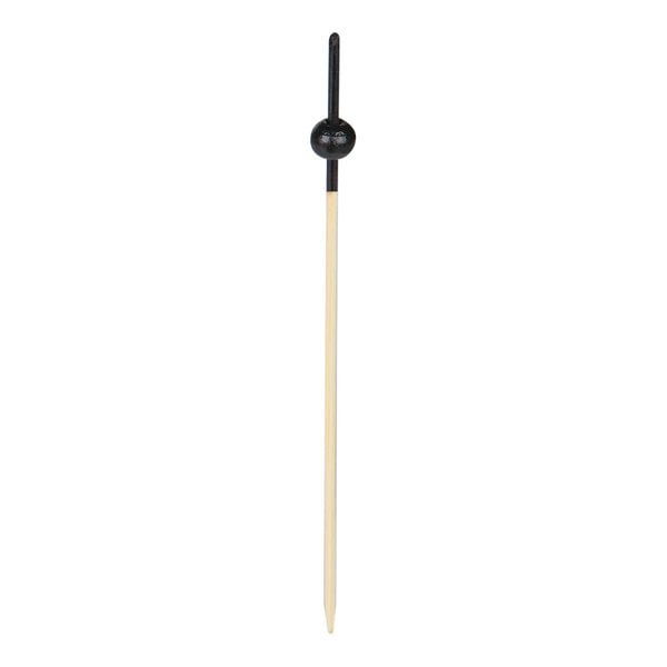 A black beaded bamboo food pick with a wooden stick.