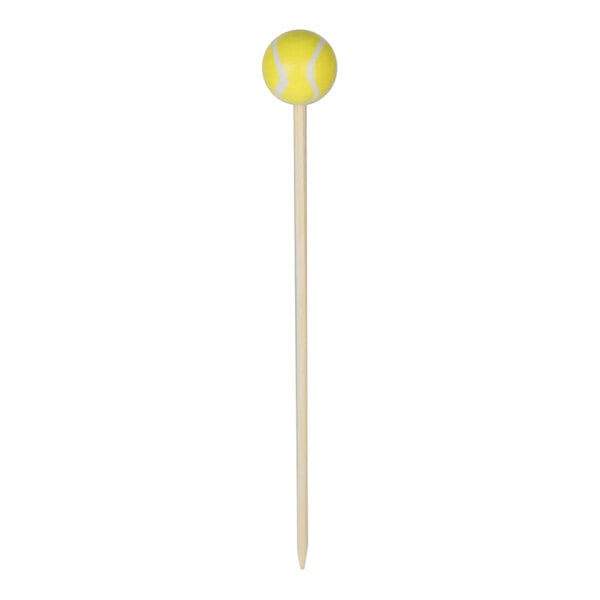A white stick with a yellow tennis ball on the end with white stripes.