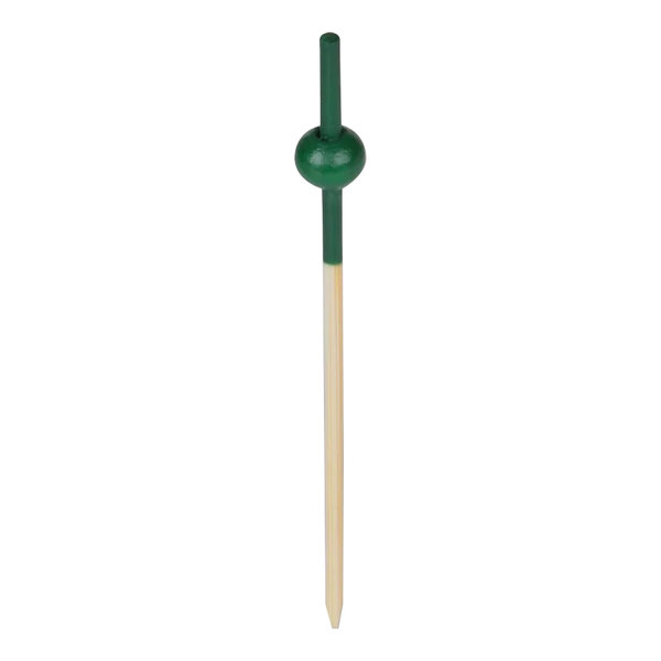 A green bamboo food pick with a green beaded end.