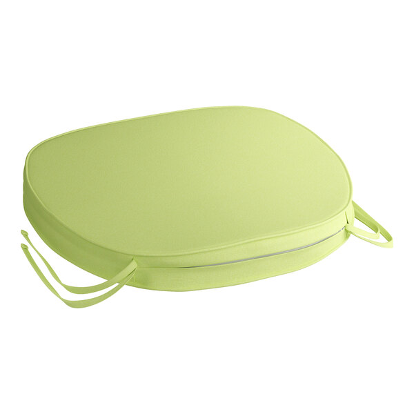 A green chair and bar stool cushion with ties.