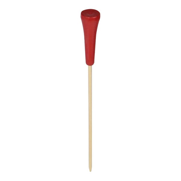 A red bamboo food and cocktail pick with a bamboo golf tee on top.