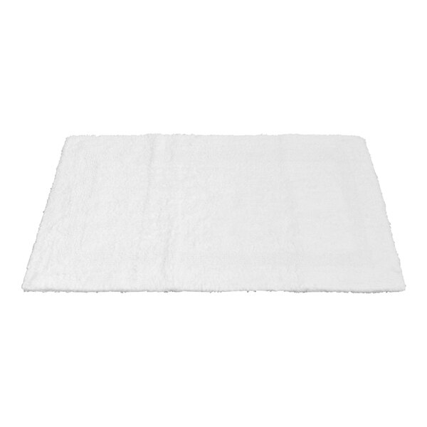 A Garnier-Thiebaut white cotton bath rug.