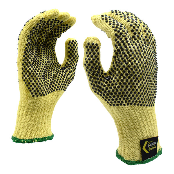 A pair of yellow Cordova warehouse gloves with black dots on the palms.